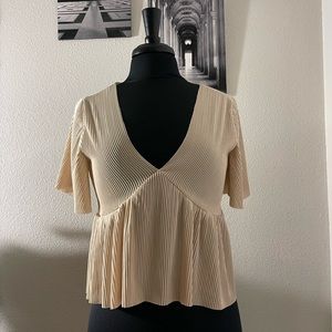 Ribbed V- Neck Ruffle Hem Tee